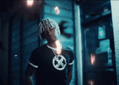 Man With Dreadlocks Wearing X-Men Shirt GIF