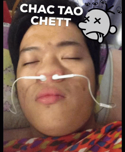 Man With Ear Buds In Nose And Chac Tao Chett Face GIF