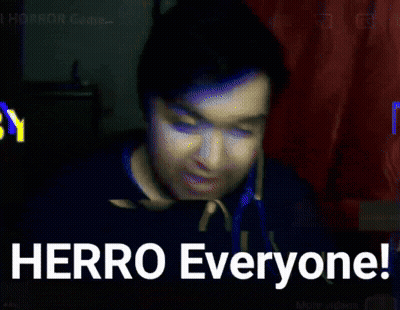 Man With Ear Buds Says Herro Everyone GIF