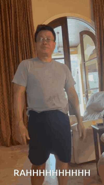 Man With Ear Muffs And Unicorn Headband GIF