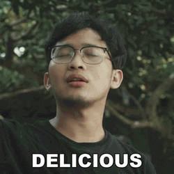 Man With Eyeglass Discussing Delicious Snack GIF