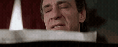 Man With Eyes Closed And Candle GIF