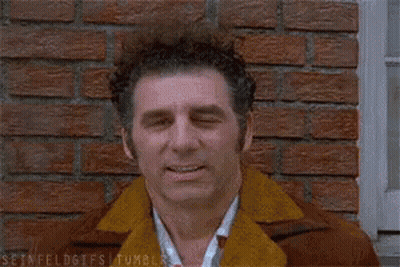 Man With Eyes Closed And Fan Blowing GIF