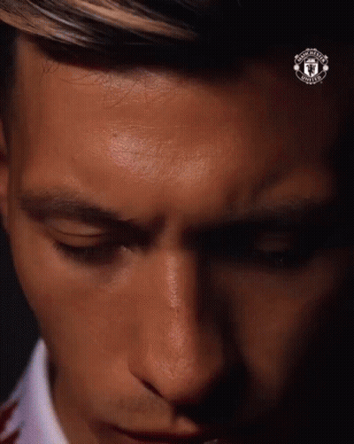 Man With Eyes Closed And Man United Logo GIF