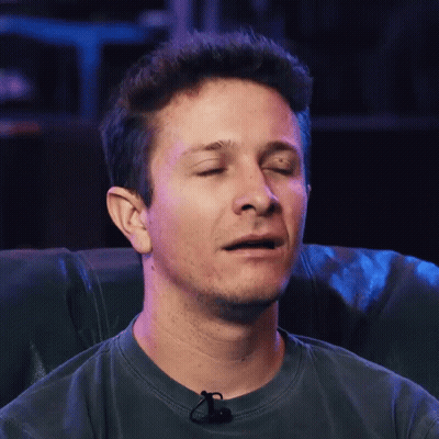 Man With Eyes Closed And Microphone GIF