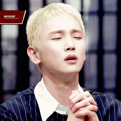 Man With Eyes Closed And Move Delight Sign GIF