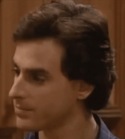 Man With Eyes Closed And Ponytail GIF