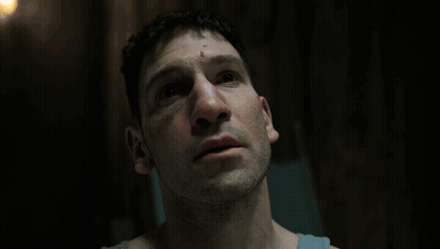 Man With Eyes Closed In Dark Room GIF