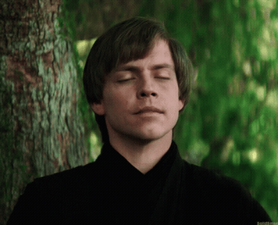 Man With Eyes Closed in Front of Tree