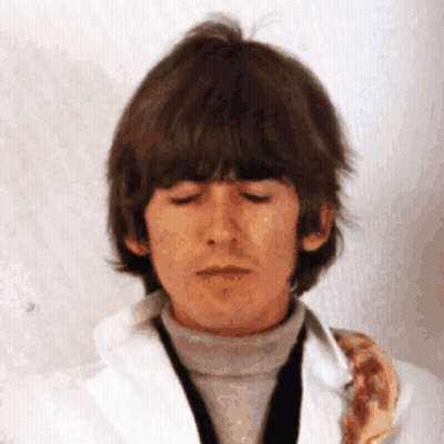 Man With Eyes Closed In White Jacket Tie GIF