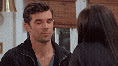 Man With Eyes Closed Looking At Woman GIF
