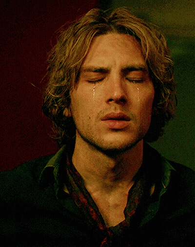 Man With Eyes Closed Pointing GIF