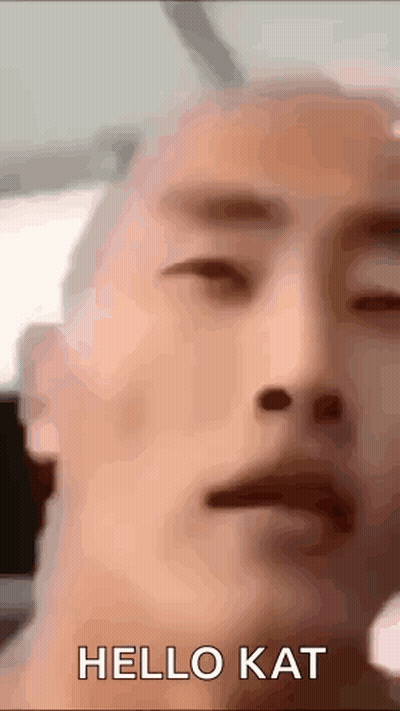 Man With Eyes Closed Saying Hello Kat GIF