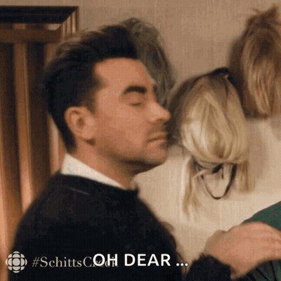 Man With Eyes Closed Saying Oh Dear To Woman GIF