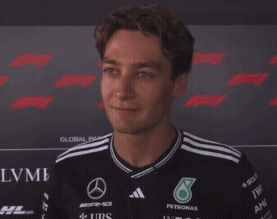 Man With Eyes Closed Wearing AMG Petronas Shirt GIF