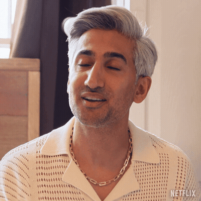 Man With Eyes Closed Wearing Netflix Logo GIF