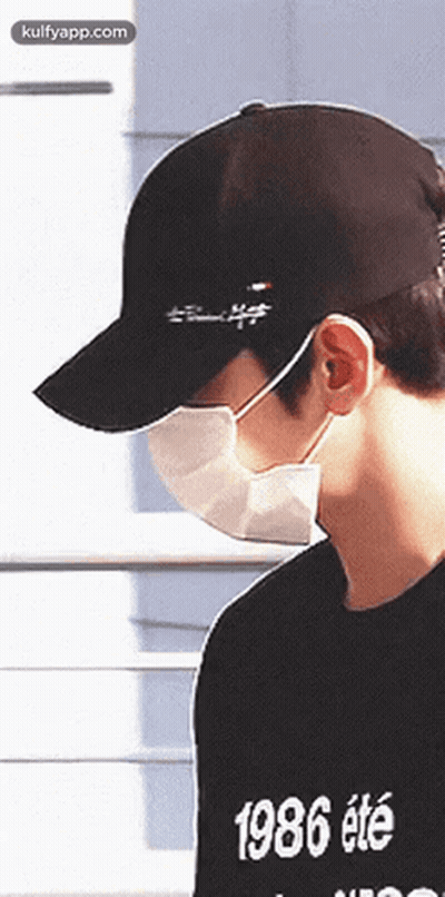 Man With Face Mask And Hat 1986 GIF
