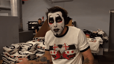 Man With Face Paint And Wrestling Shirt GIF