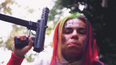 Man With Face Tattoo And 666 On Arm GIF