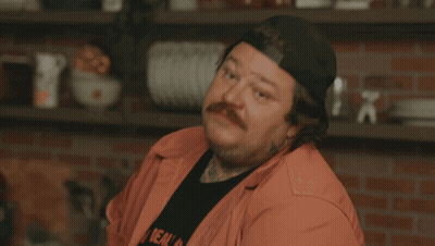 Man With Face Tattoo Wearing Hat GIF