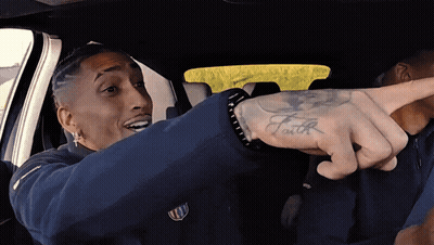 Man With Faith Tattoo On Arm GIF