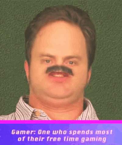 Man With Fake Mustache Saying Gamer One Who Spends Most Of Their Free Time Gaming GIF