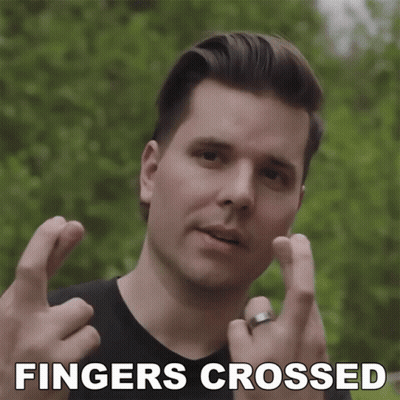 Man With Fingers Crossed Saying Fingers Crossed GIF