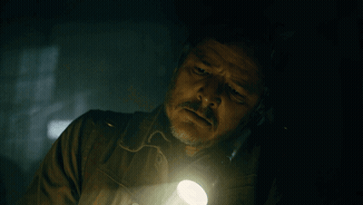 Man With Flashlight In Dark GIF