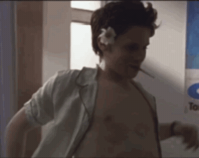 Man With Flower In Hair And Cigarette GIF