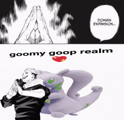 Man With Folded Hands Next To Goomy Goop Realm Stuffed Animal GIF