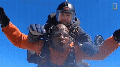 Man With G Helmet Jumping With Another Man GIF