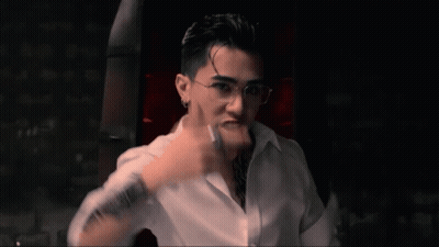 Man With Glasses And Arm Tattoo Making Funny Face GIF