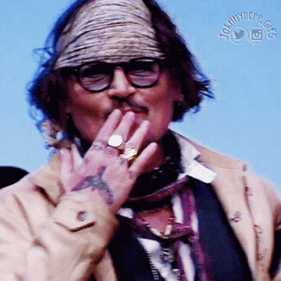 Man With Glasses and Bandana Covering Mouth Johnnydepp.com