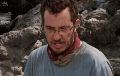 Man With Glasses And Bandana In Rocky Area Saying Life GIF