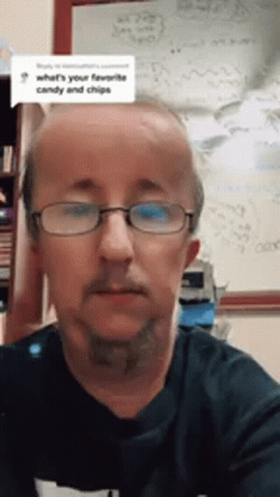 Man With Glasses And Beard At Whiteboard GIF