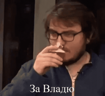 Man With Glasses And Beard Drinking From Cup Saying Za Vlado GIF