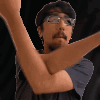 Man With Glasses And Beard Holding Arm Up GIF