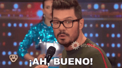 Man With Glasses And Beard Holding Microphone Saying Ah Bueno GIF