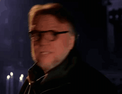 Man With Glasses And Beard Holding Nickelodeon Can GIF