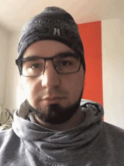 Man With Glasses And Beard In Beanie And Hoodie GIF