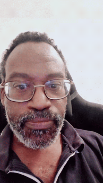 Man With Glasses And Beard In Black Shirt GIF