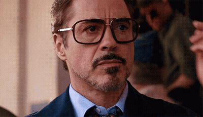 Man With Glasses And Beard In Blue Shirt And Tie GIF