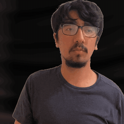 Man With Glasses And Beard In Blue Shirt GIF
