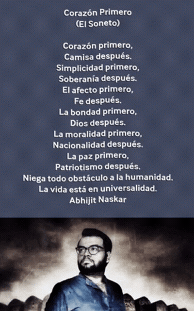Man With Glasses And Beard In Front Of Corazon Primero Poster GIF