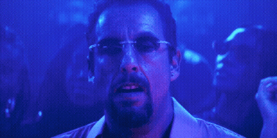 Man With Glasses And Beard In Front Of Crowd GIF