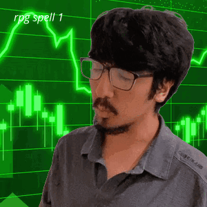 Man With Glasses And Beard In Front Of Green Graph Saying RPG Spell 1 GIF