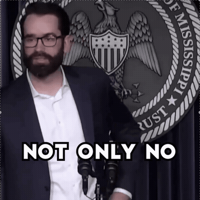 Man With Glasses And Beard In Front Of Not Only No Sign GIF