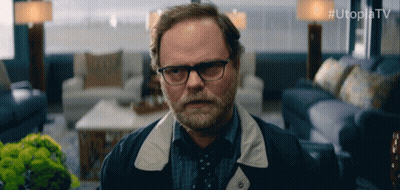 Man With Glasses And Beard In Living Room Utopiatv GIF