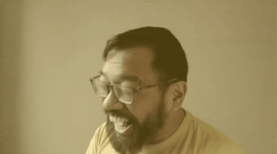 Man With Glasses And Beard Laughing GIF