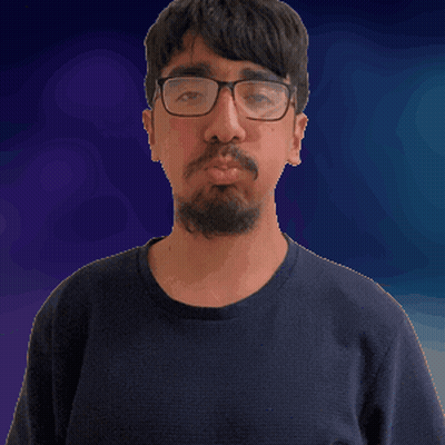 Man With Glasses And Beard Looking At Camera GIF